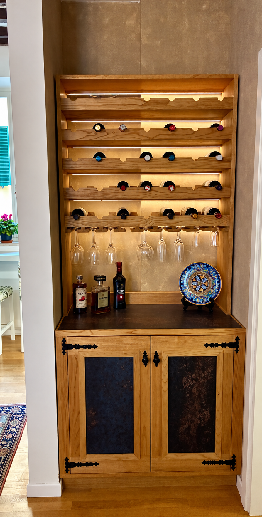 Rich’s bespoke illuminated timber drinks and wine cabinet with bottle racks and lower cupboard doors