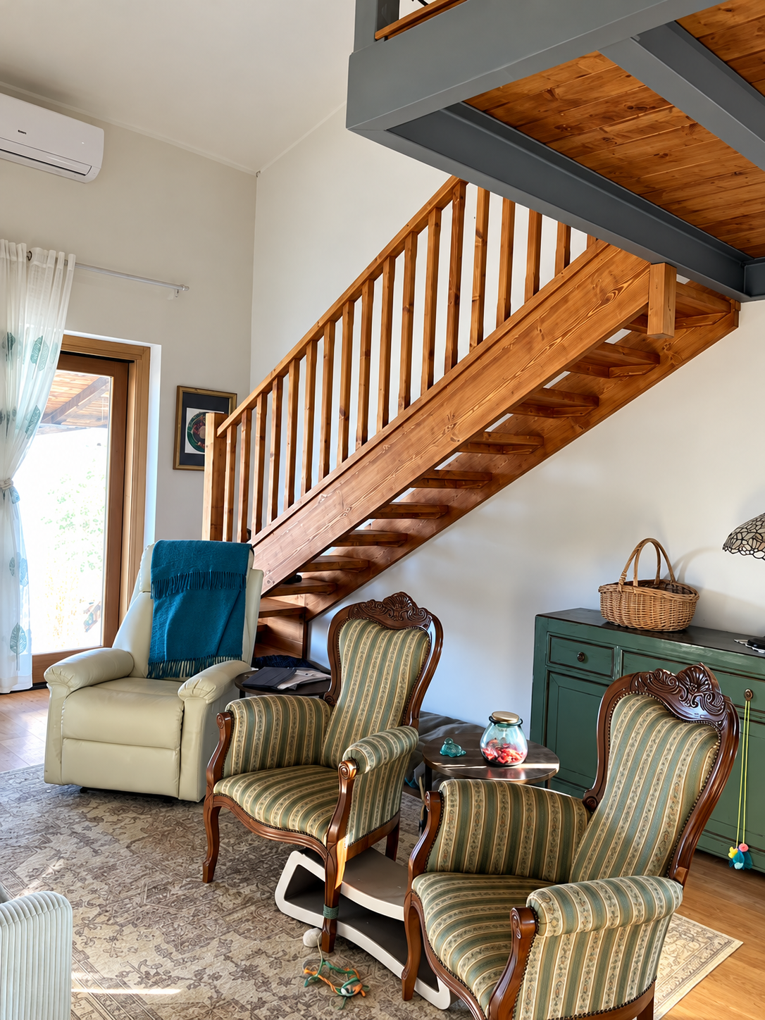 Rita’s handcrafted wooden staircase viewed from the sitting room
