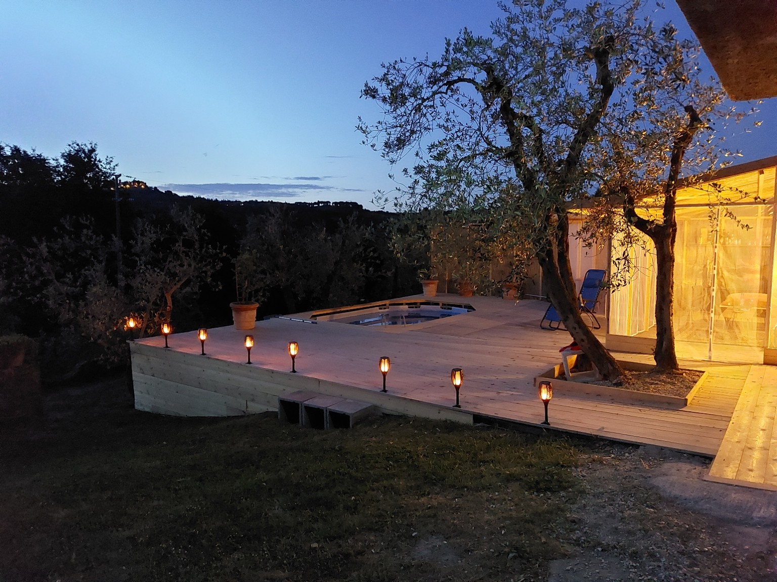 Rich’s original sunset photograph with olive trees, terrace and warm evening lights